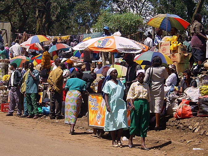 Colorful dressed people in the Nairobi market, Kenya 2000