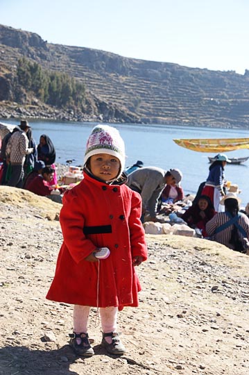A dressed-up girl at the Wednesday morning market, Amantani Island, Lake Titicaca 2008