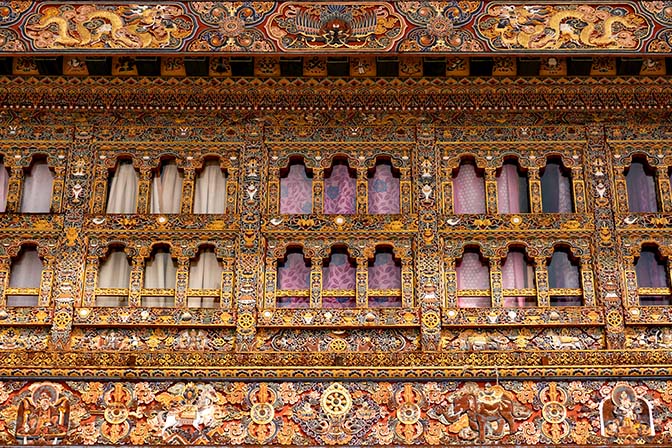 Rich carved and painted front wall at Gangtey Dzong/Monastery/Gompa, 2018