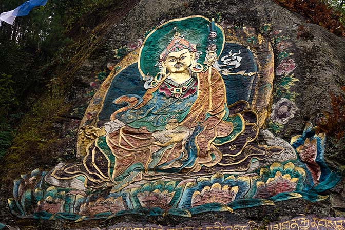 Guru Rinpoche in his manifestation as Pema Jungne bringing the teachings to Tibet, on a rock face outside of Thimphu, 2018