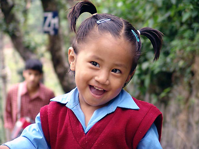 A smiling Tibetan girl from Yongling school in McLeod Ganj, 2004