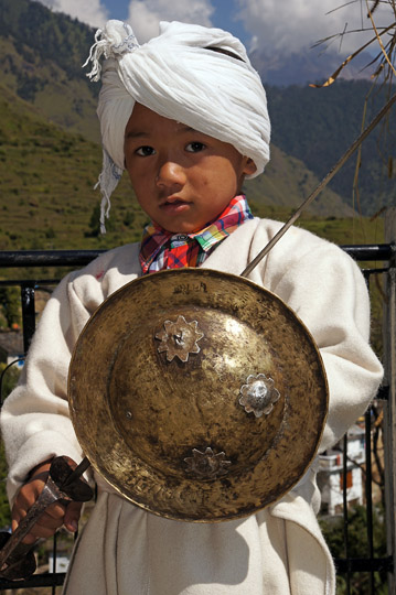 Rung boy in traditional dress with a dagger and shield, Teejya 2011