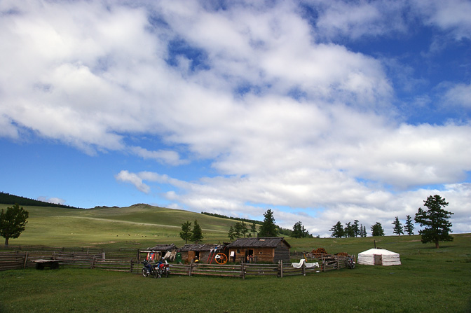A family's wooden huts and Ger (Mongolian home tent) near Renchinlkhumbe, North Mongolia 2010