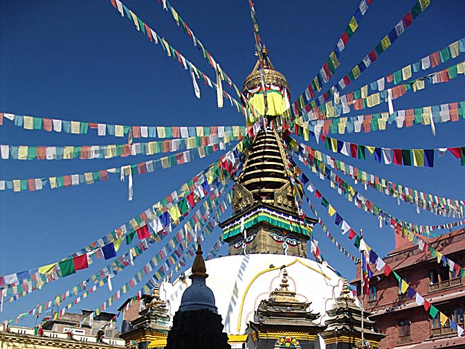 Prayer flags fluttering from the top of the Naradevi Stupa, at Ekha Pokhar road, 2004