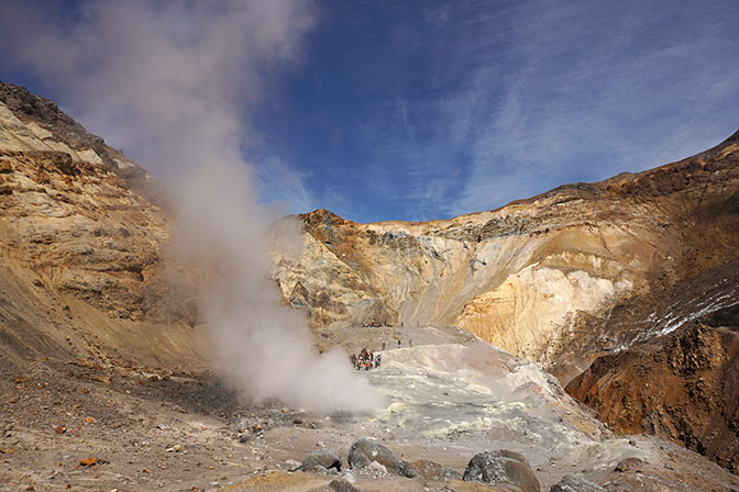 Colored soil and steam jet in the caldera of Mutnovski active volcano, 2016