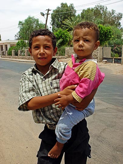 Carrying the Young in Tarabin in Nuweiba, Sinai Peninsula, Egypt 2003