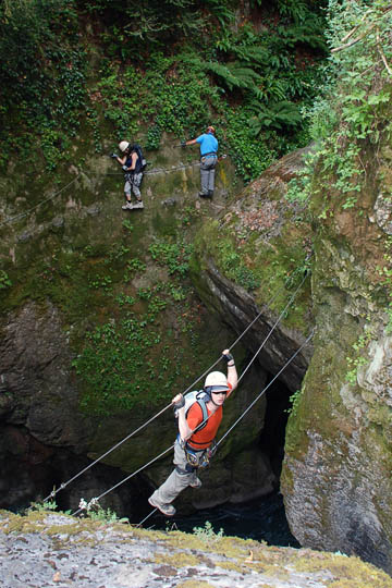 Gaash is sliding a Monkey Bridge in Lantosque Canyon, France 2011