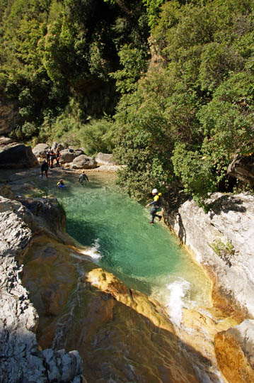 Kobi jumps into the clear water of the Barbaira Canyon, Italy 2011