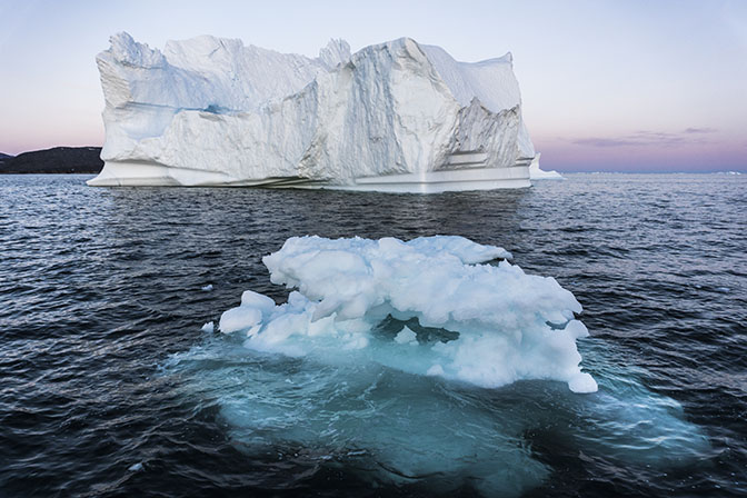 Different types of icebergs afloat between sunset and sunrise, 2017