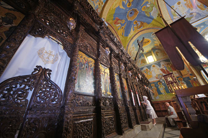 Prayers by the iconostasis in The Greek Orthodox Church of the Annunciation (The Church of St. Gabriel), Nazareth 2013