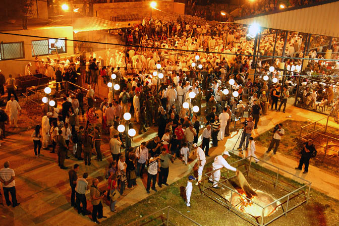 Altar area crowded with white dressed Samaritans and guests, Mount Gerizim 2011