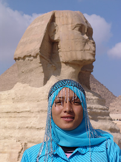 A local young Muslim woman wearing veil (Hijab) and the Great Sphinx of Giza, 2006