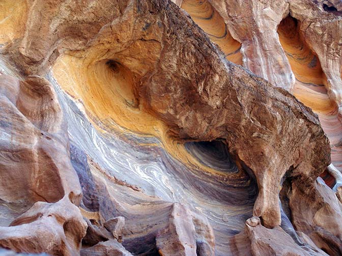 Multicolored sandstone exposed in the Tafoni (window) in the Rainbow Canyon of Wadi Qseib, 2006