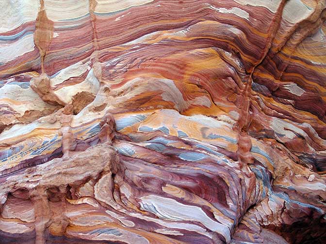 Multicolored sandstone, purple, orange, yellow, red, green, blue and more in the Rainbow Canyon of Wadi Qseib, 2006