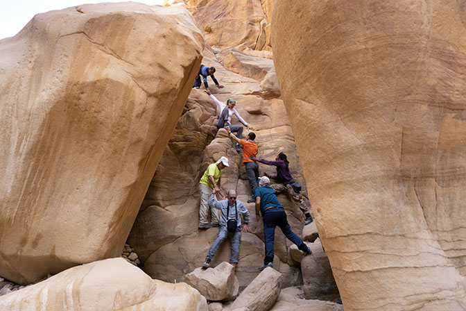 Going down through a dry waterfall in Wadi Mshaze, 2018