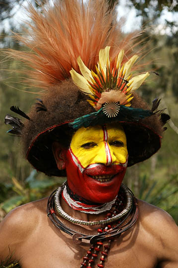 Paul, the Huli Tribe bachelor-village teacher, gets prepared for a singsing (cultural show), Tari 2009