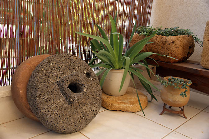 Flowerpots and grinding stones in the balcony, 2009