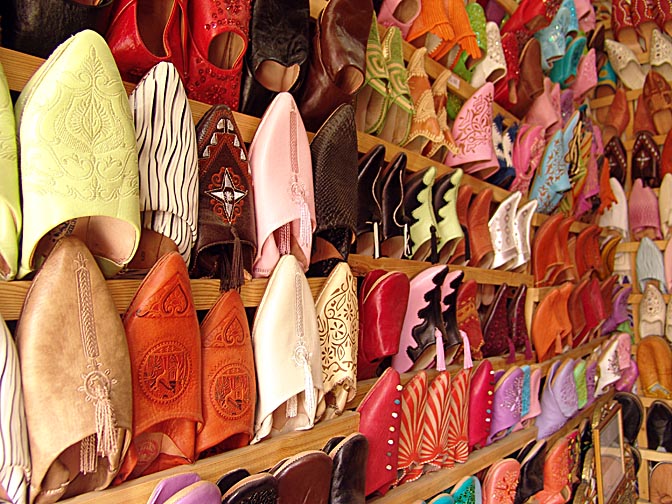 Display of colorful slippers in a market stand, The Medina (old city) 2007