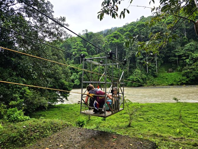 Crossing the Pequare River in a small basket while pulling a hand pulley, 2026
