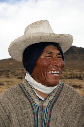 A local nomad man wearing a poncho and a hat, Hatun Machay, Cordillera Negra 2008