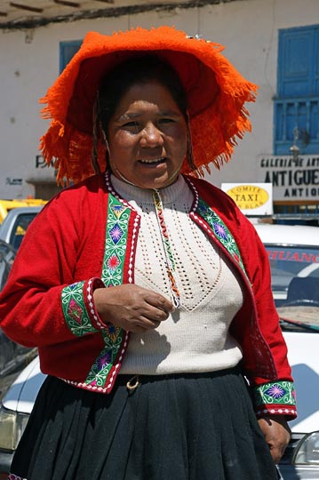 A Chola (local woman) with a decorated hat in the street, Cusco 2008