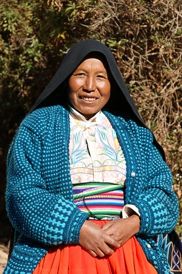Eusevia with her traditional cloths by her house, Amantani Island, Lake Titicaca 2008