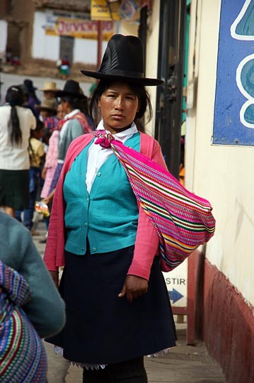 A Chola (local woman) with a decorated hat in the street, Marcara 2008