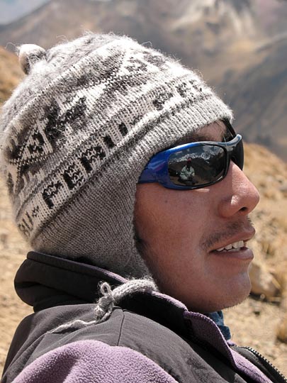 Angel Callupe and me reflected in his sunglasses, Mount Huacrish 2008 (photographed by Aviv Halman)