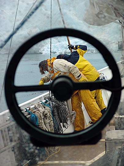 Kati and Helen helping to weigh anchor in Smaaland Cove, 2004