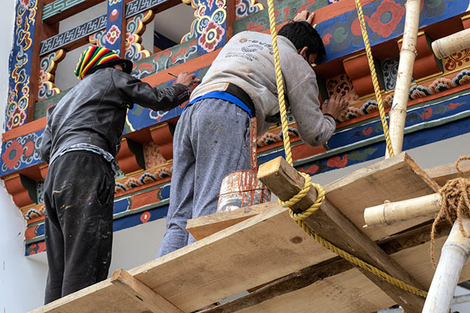 Artists decorating the Thimphu Textile Museum, 2018