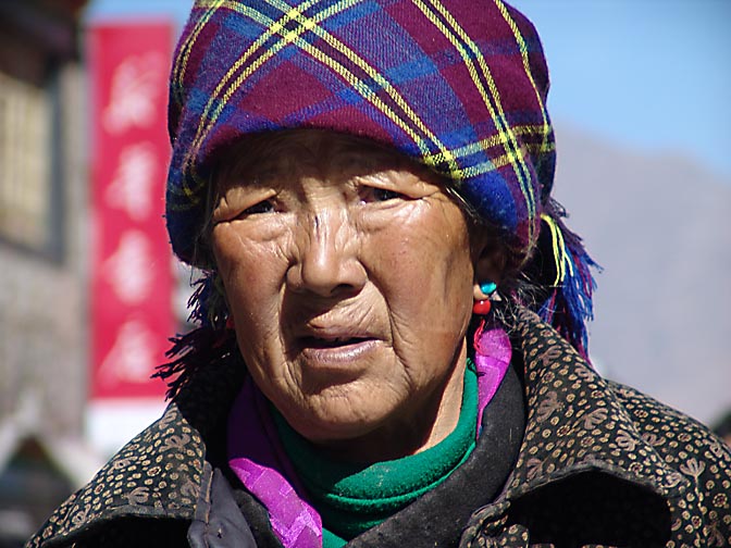 A Tibetan woman along by the Lingkor around the Jokhang, Lhasa 2004