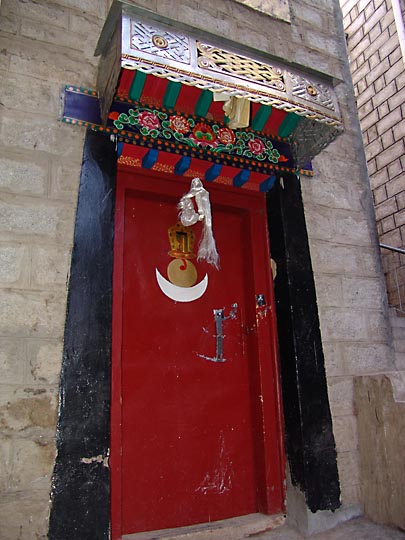 A traditionally painted door close to Barkhor Square, Lhasa 2004