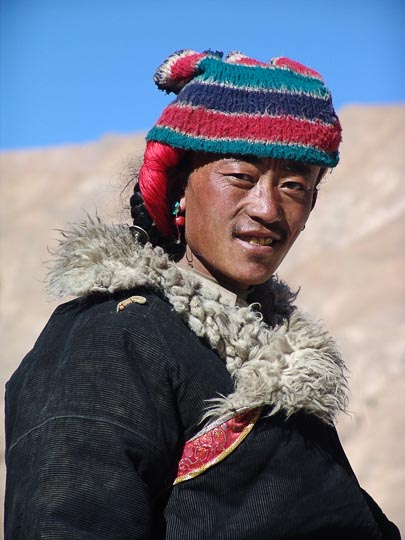 A colorful Tibetan man nearby Old Tingri, 2004