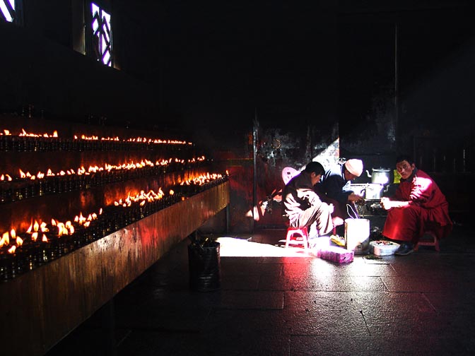 Butter candles manufacturing in front of the Jokhang, Lhasa 2004