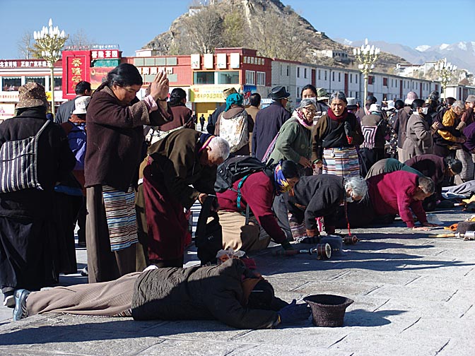 Pilgrims prostrating in front of the Potala, Lhasa 2004