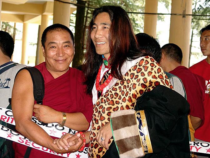 A singer and a monk, at the Dalai Lama birthday celebration, in the Temple in McLeod Ganj, 2004