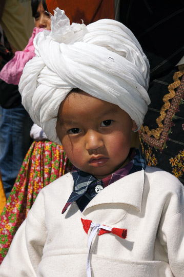 Boy dressed as a traditional Rung, Pangu 2011