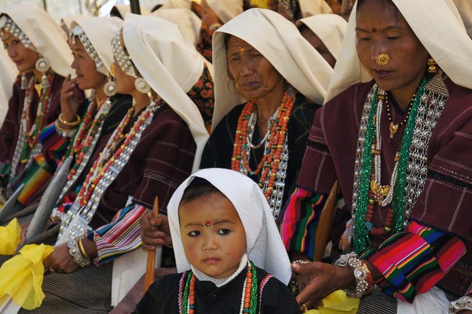 Child and women dressed in traditional Rung, Pangu 2011
