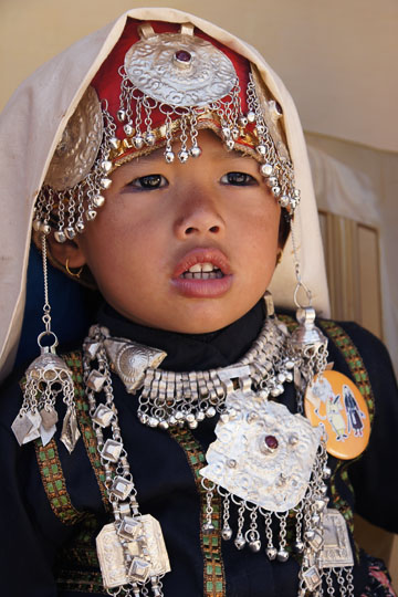 Girl wearing traditional silver jewelry, Teejya 2011