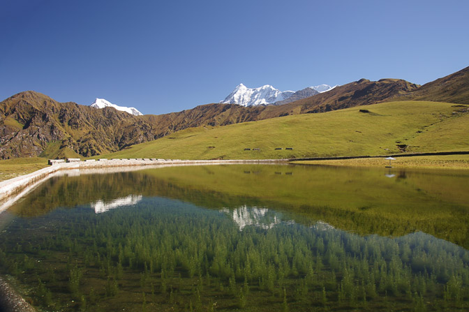 The Himalaya peaks reflect in a lake in Bedni Bugyal, Roopkund trek 2011