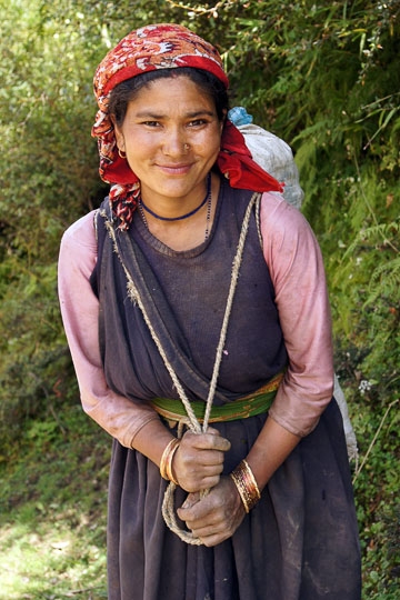 Young girl from Wan carrying a sack of potatoes on her back, Roopkund trek 2011