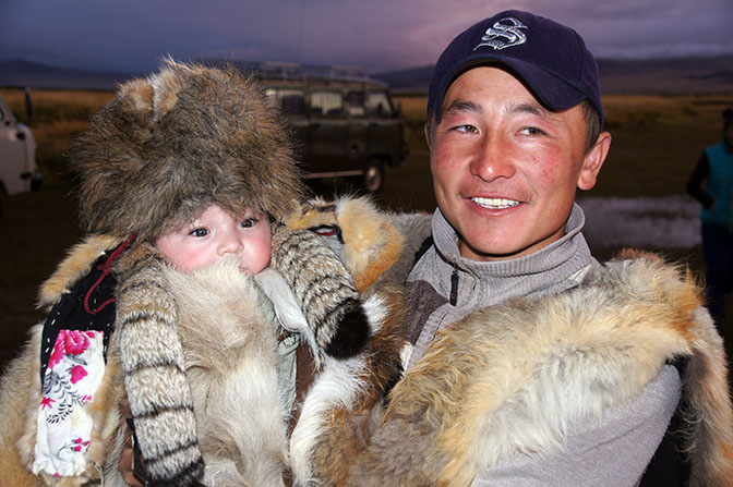 Mongolian-Kazakh nomad and his son, 2014