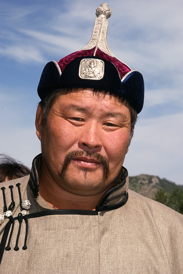 A wrestler in traditional Mongolian hat and robe, Tsetserleg 2010