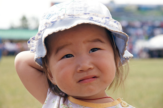 A sweet girl watching the Naadam games, Tsetserleg 2010