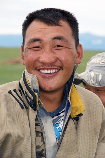 A man wearing a Mongolian coat near Renchinlkhumbe, North Mongolia 2010