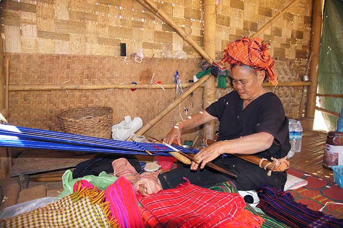 Pa O woman weaving colorful scarves in Hin Kha Bin village, Kalaw to Inle Lake trek 2015