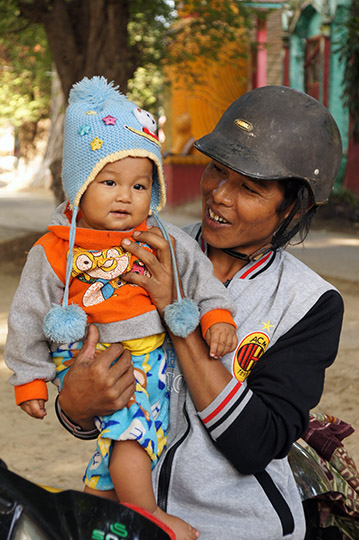 Mom carrying her baby, Mandalay 2015
