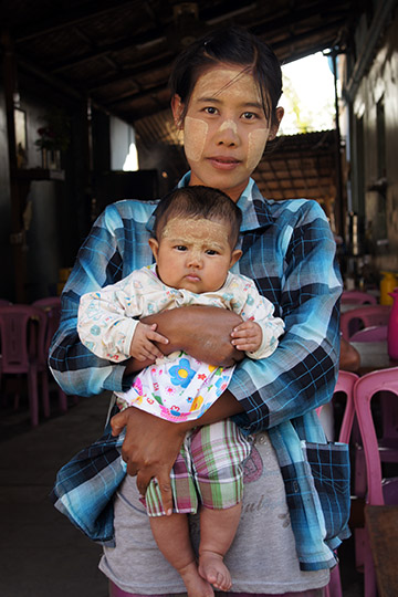 Mom holds her baby, Salay 2015