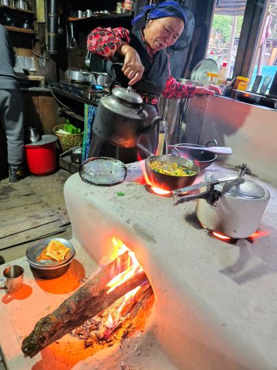 Cooking over an open fire at the Tibet Guesthouse (Lama Hotel at Changdam), 2025