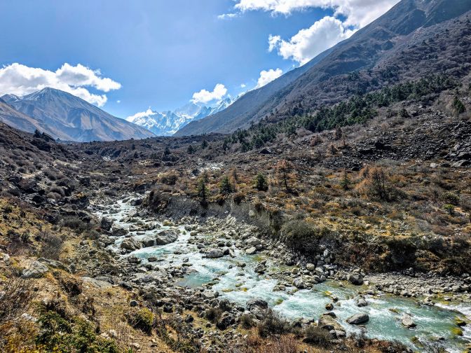 Climbing along the Langtang River towards the snowy peaks, 2025
